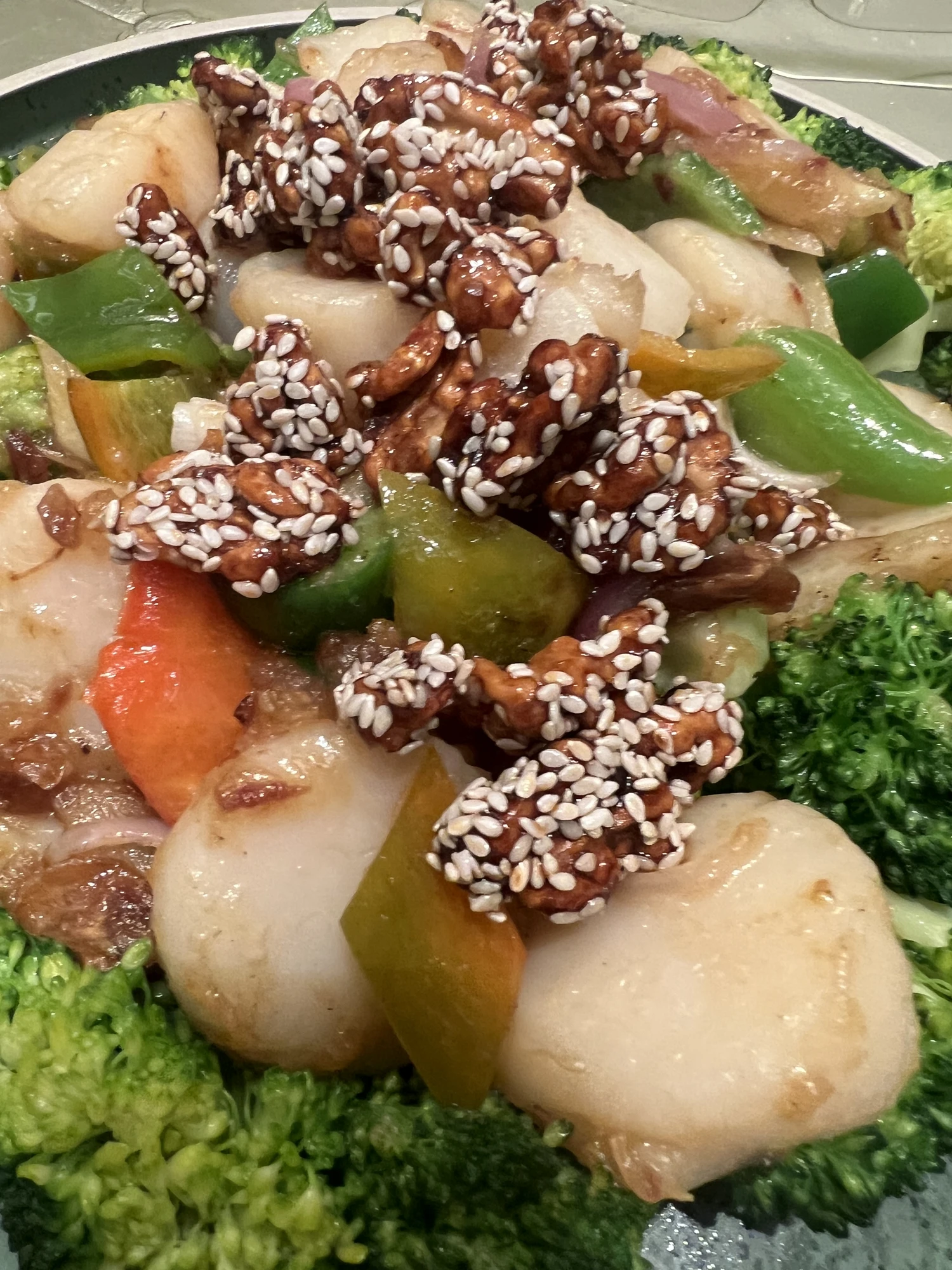 Wok-Fried US Scallop with broccoli and sesame walnut in XO sauce