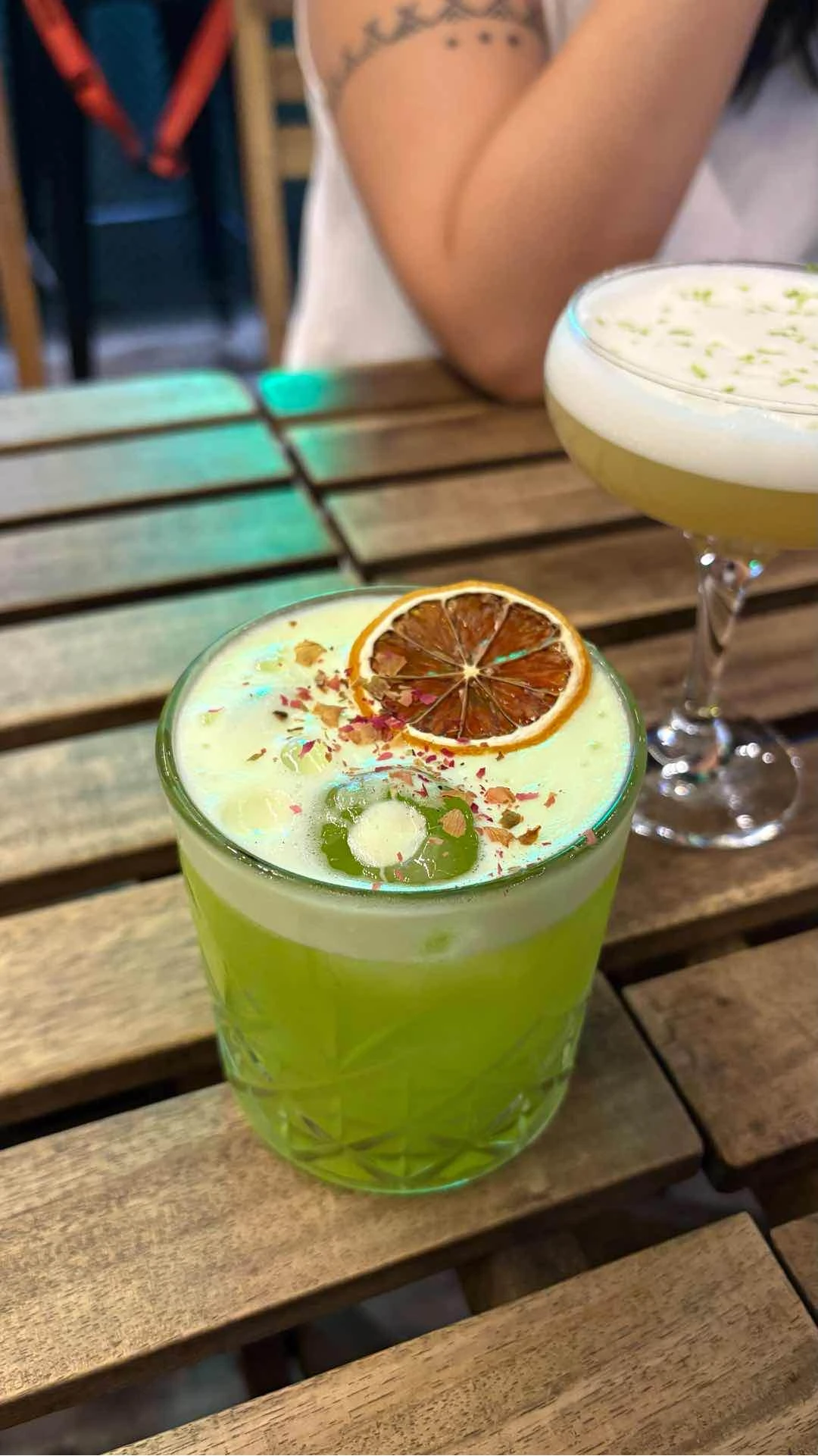 I forgot the name, it has green tea and gin (from Lotus Gin Room)