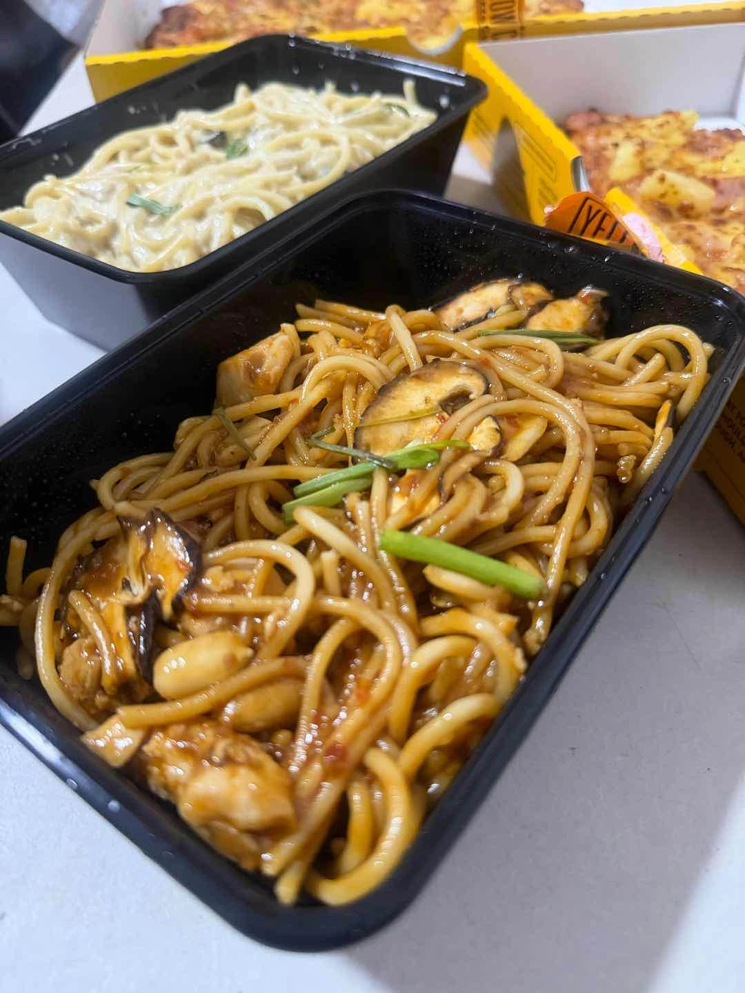 Charlie Chan Pasta and Chicken Alfredo Pasta of Yellow Cab Pizza