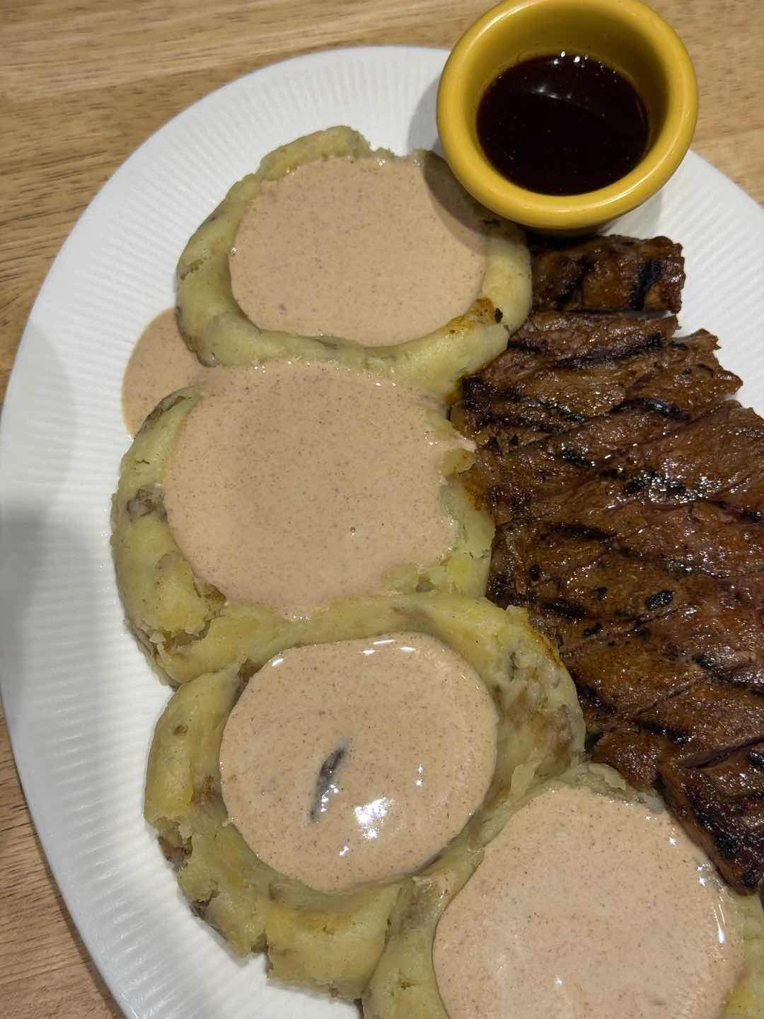 Signature Steak with mashed potatoes
