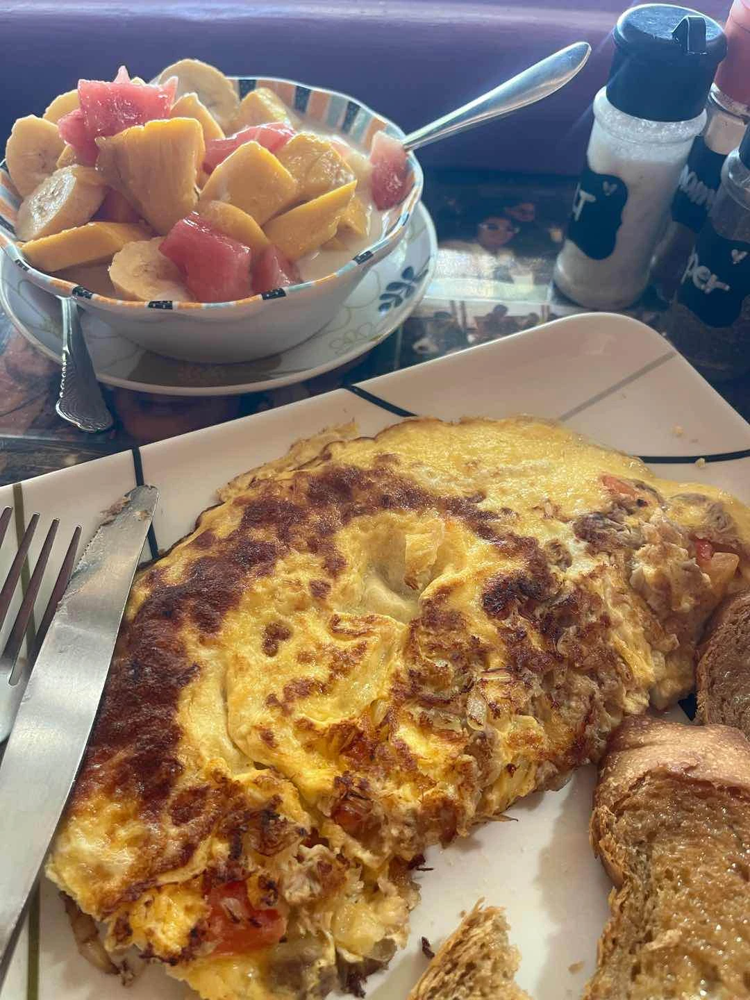 Fruit Bowl and Omellette