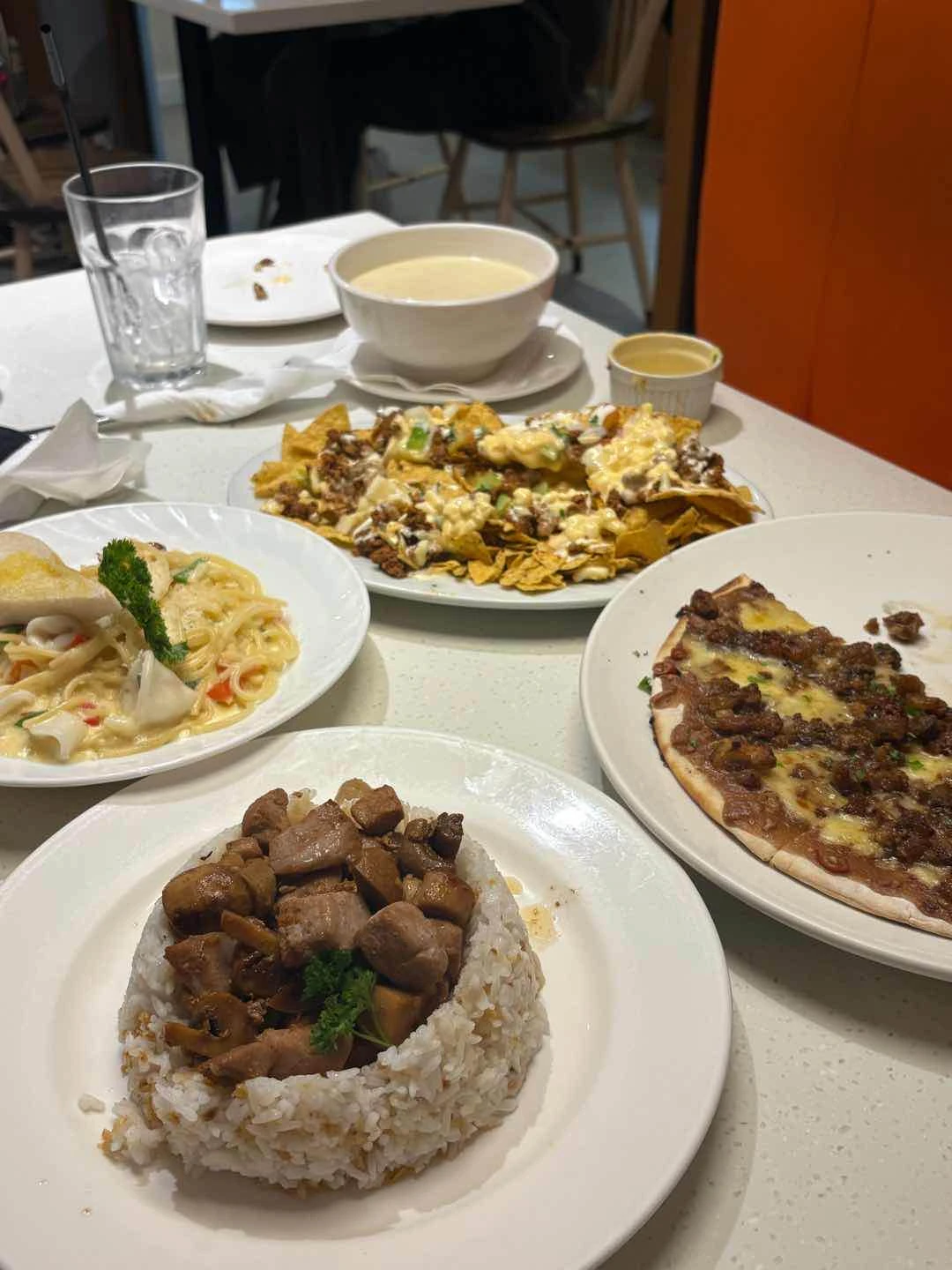 tuna salpicao, seafood pasta, sisig pizza, nachos, clam chowder