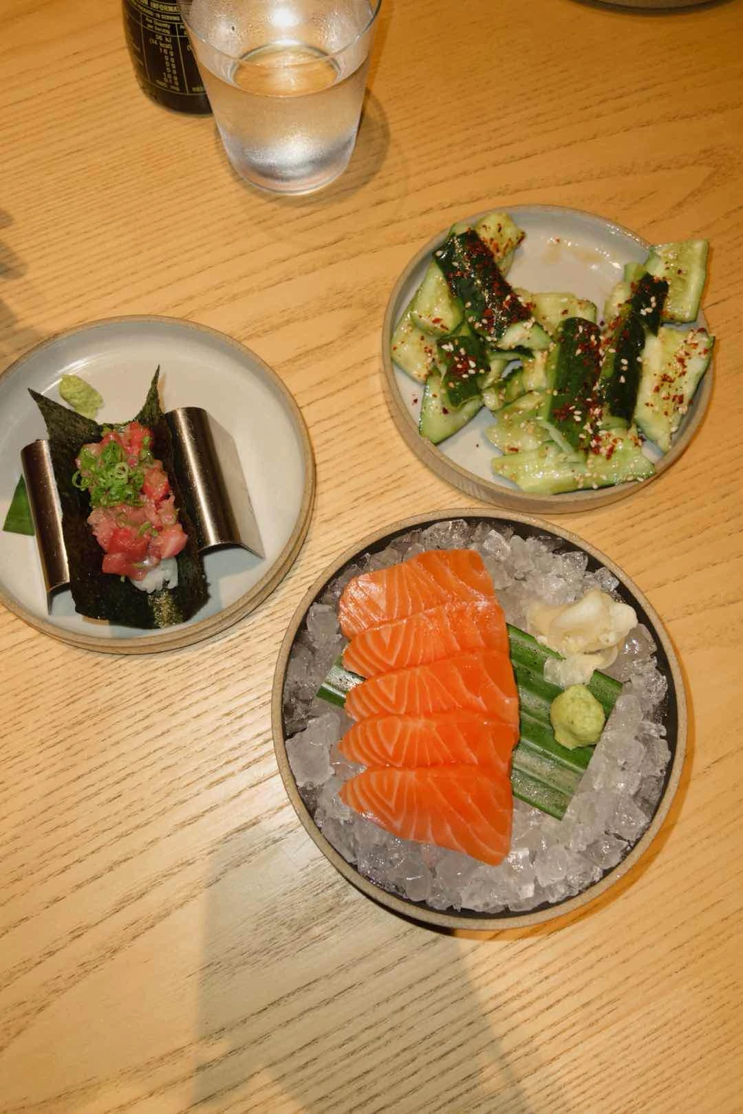 cucumbers, salmon sashimi, spicy tuna temaki