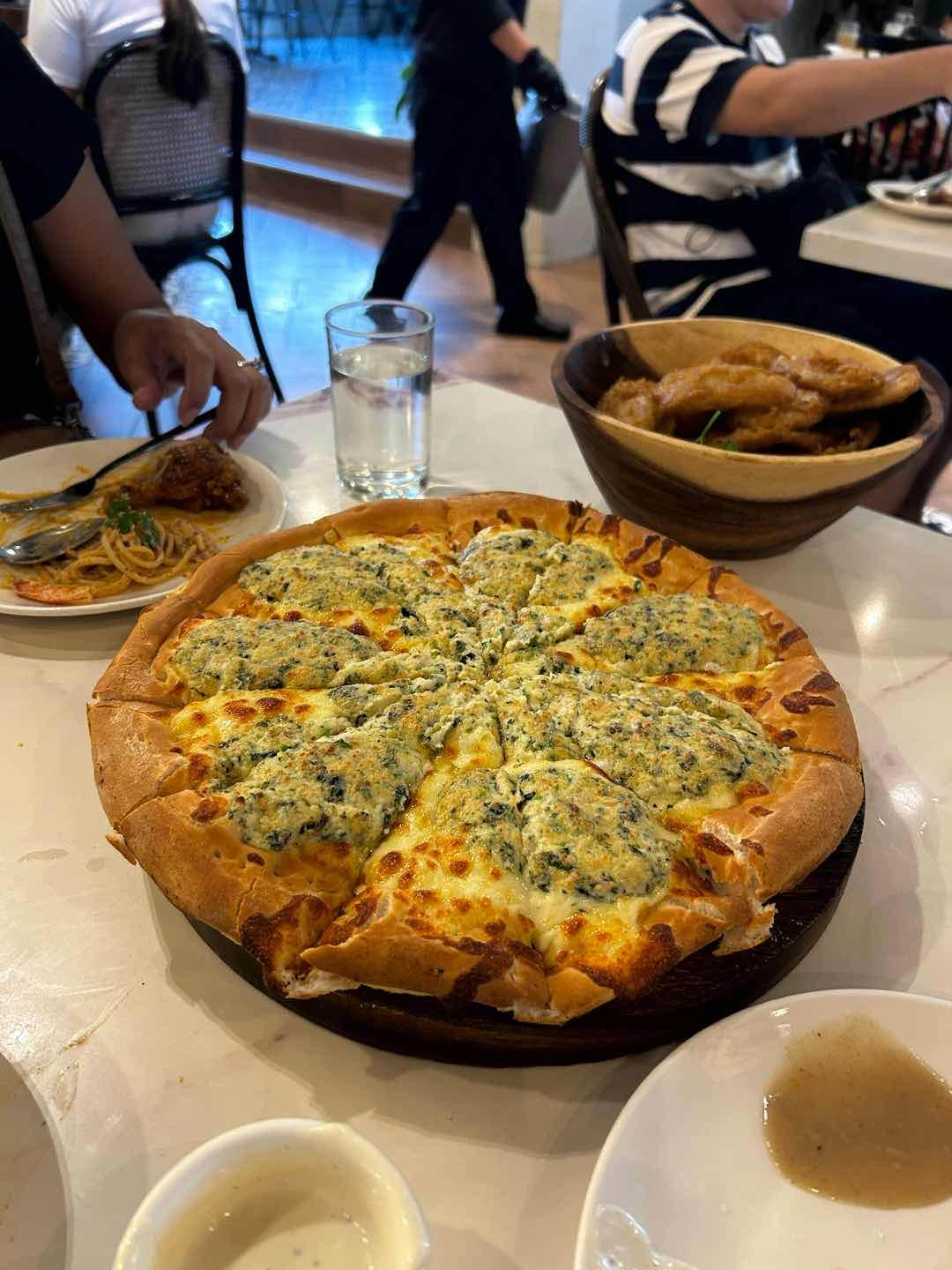 Spinach truffle pizza