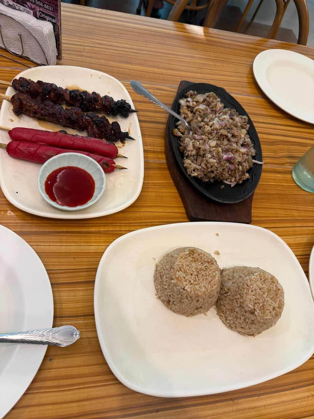 sisig, grilled hotdog, pork barbeque, fried rice