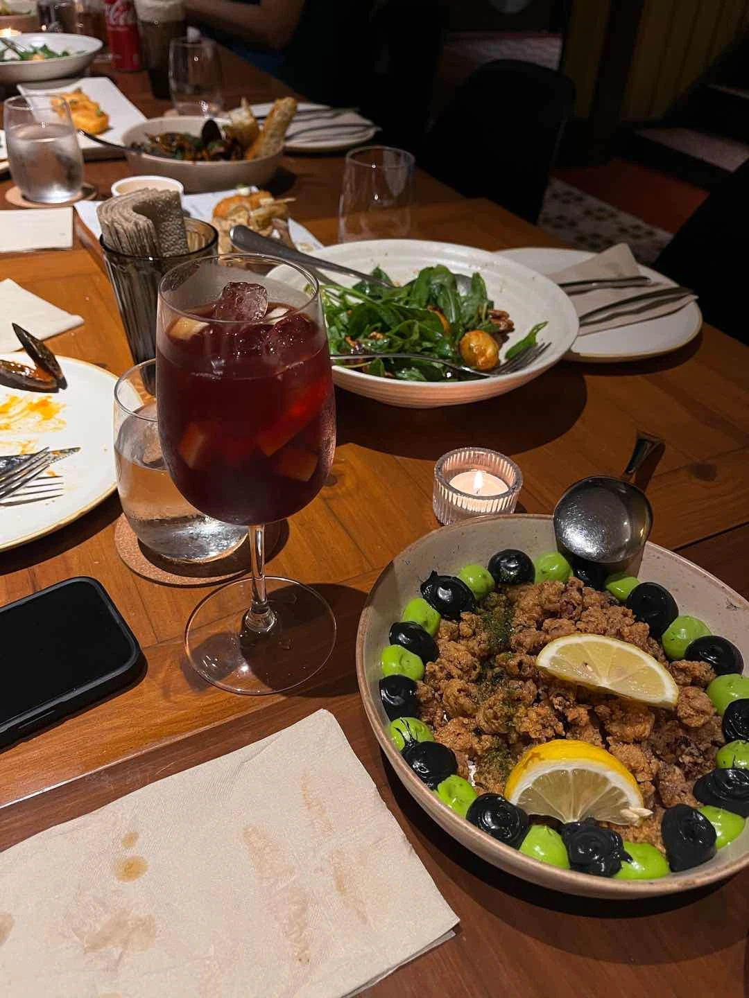 sangria, baby squid with parsley and squid ink aioli, aragula salad