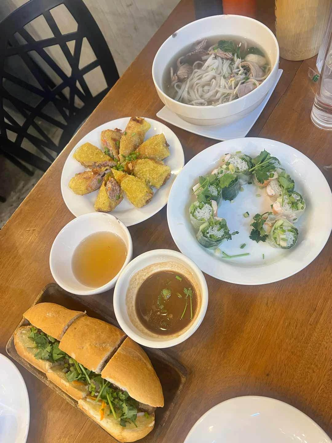 Pulled Pork Banh Mi, Fried Spring Rolls, Fresh Spring Rolls, Beef Pho of Banh Mi Manila
