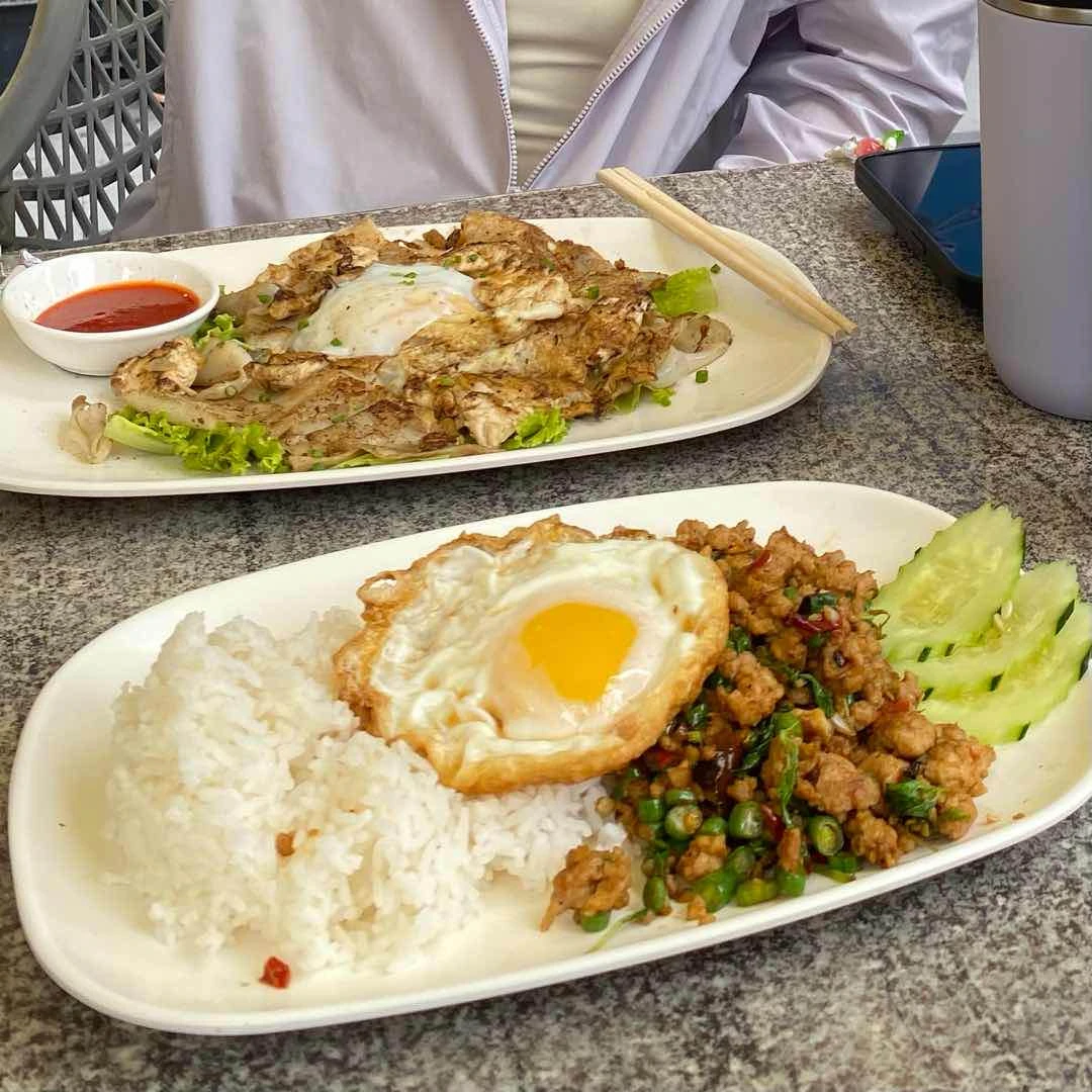Pad see ew gai and pad krapow moo sub