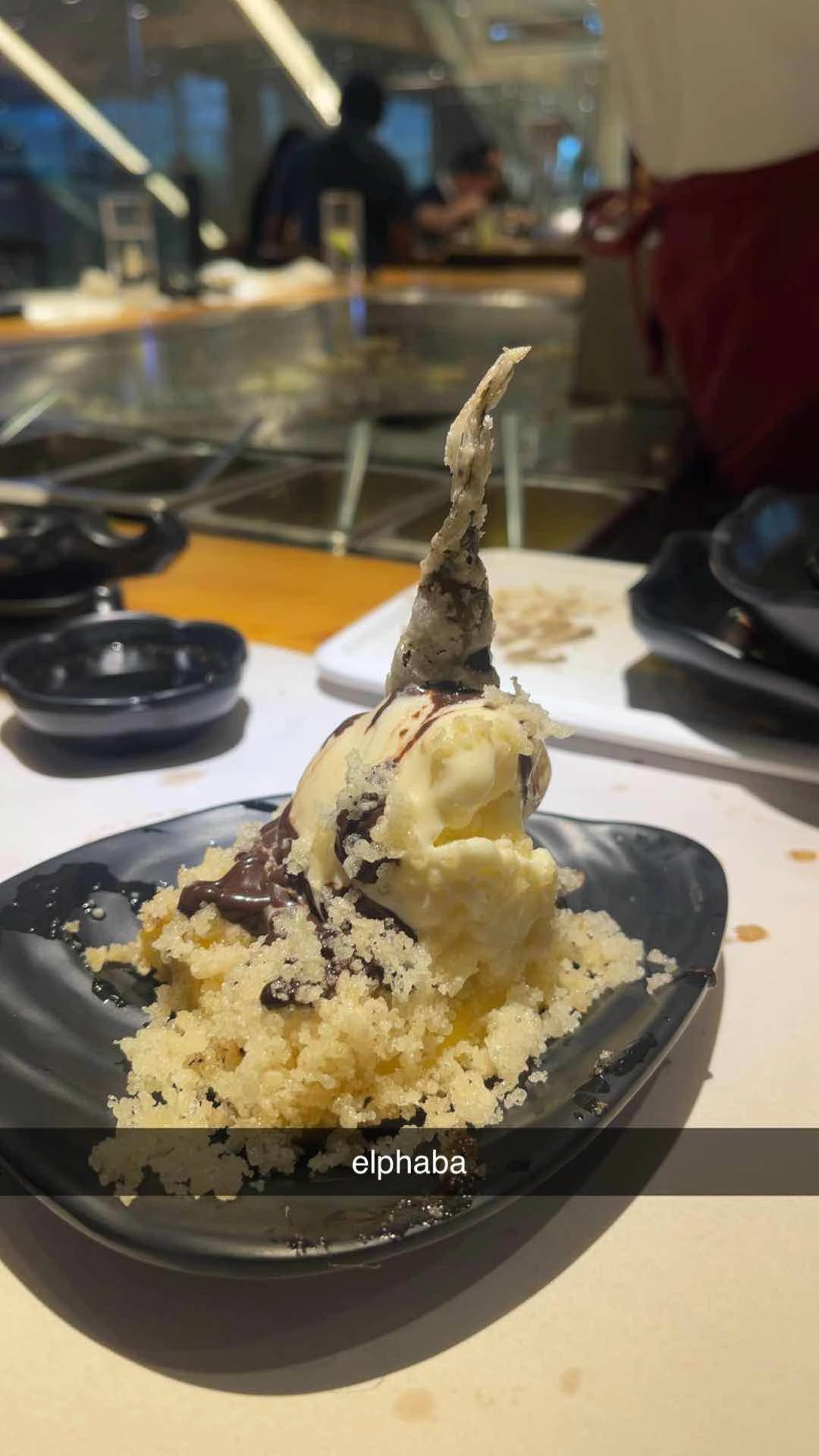 ice cream w chocolate sauce and tempura flakes
