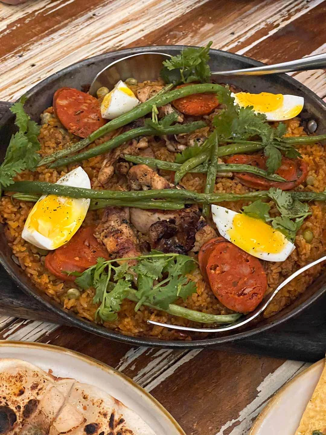 Paella Carne of Tittos Latin BBQ & Brew - Kapitolyo