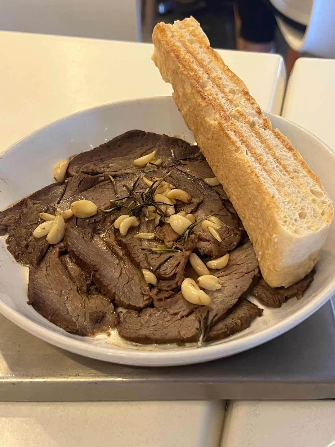 Sliced Beef Tenderloin with garlic and rosemary