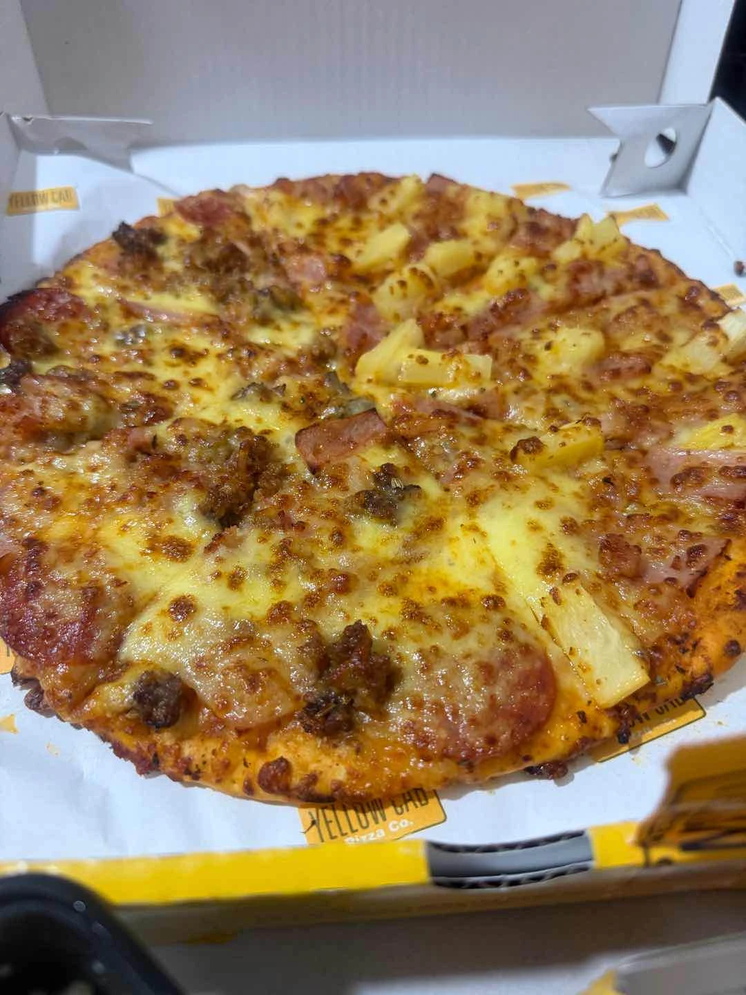 Pizza Half Manhattan Half Hawaiian  of Yellow Cab Pizza