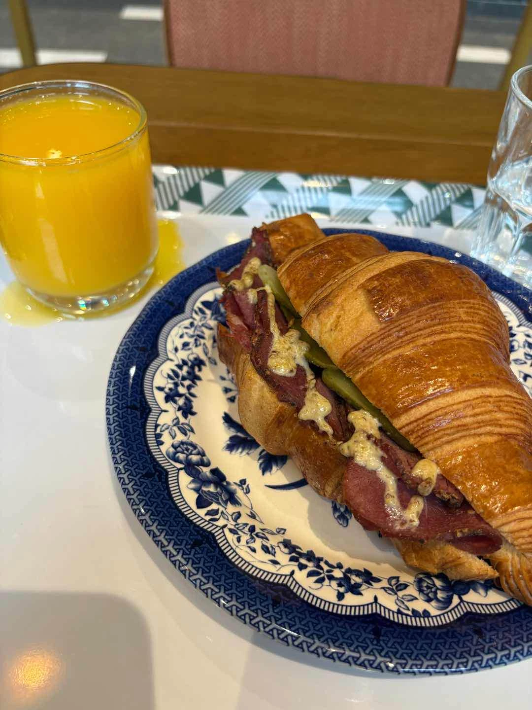 Pastrami Croissant and Orange Juice