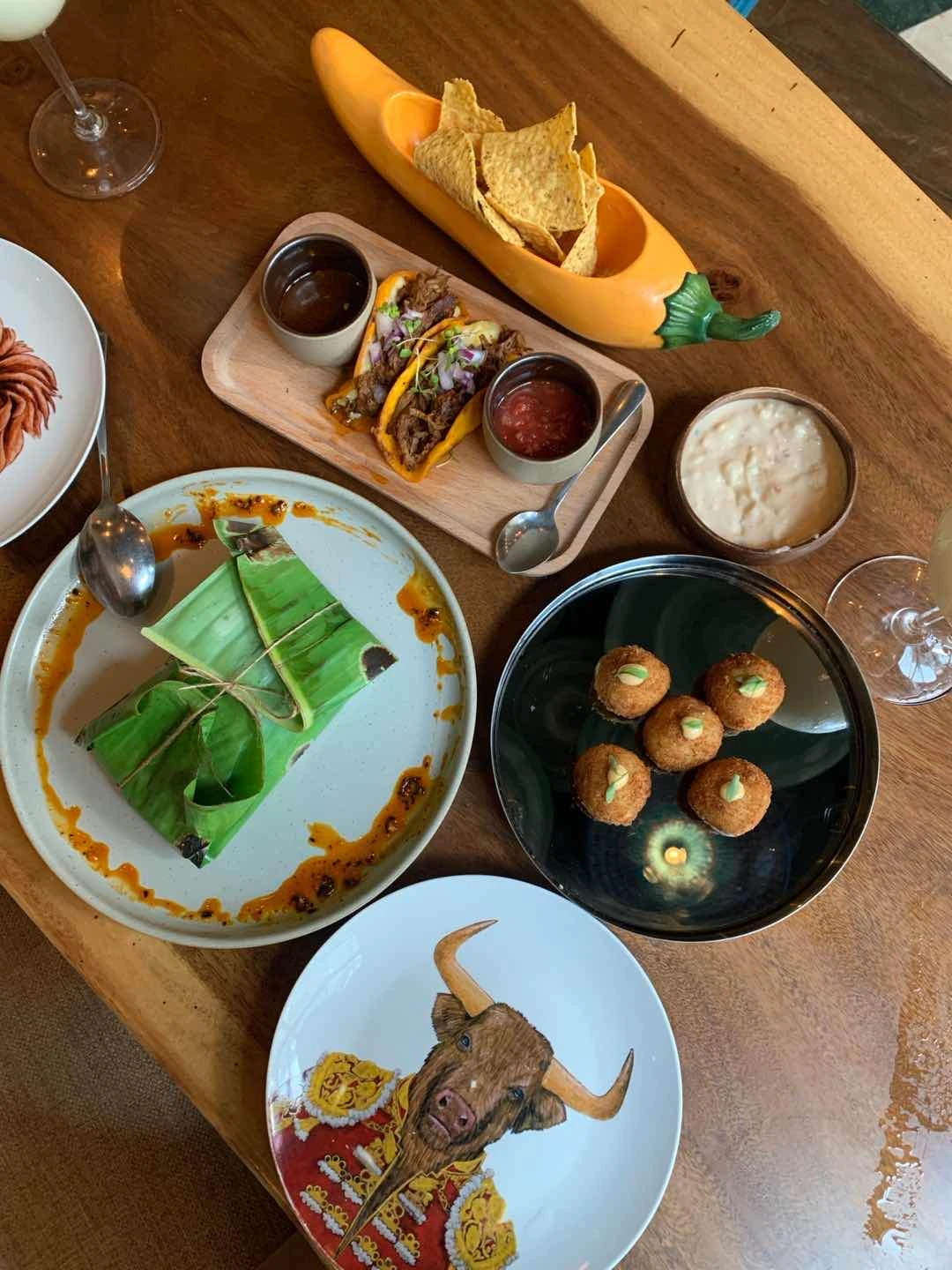 Complimentary chips, Tacos, Croquettes and a Salmon Rice