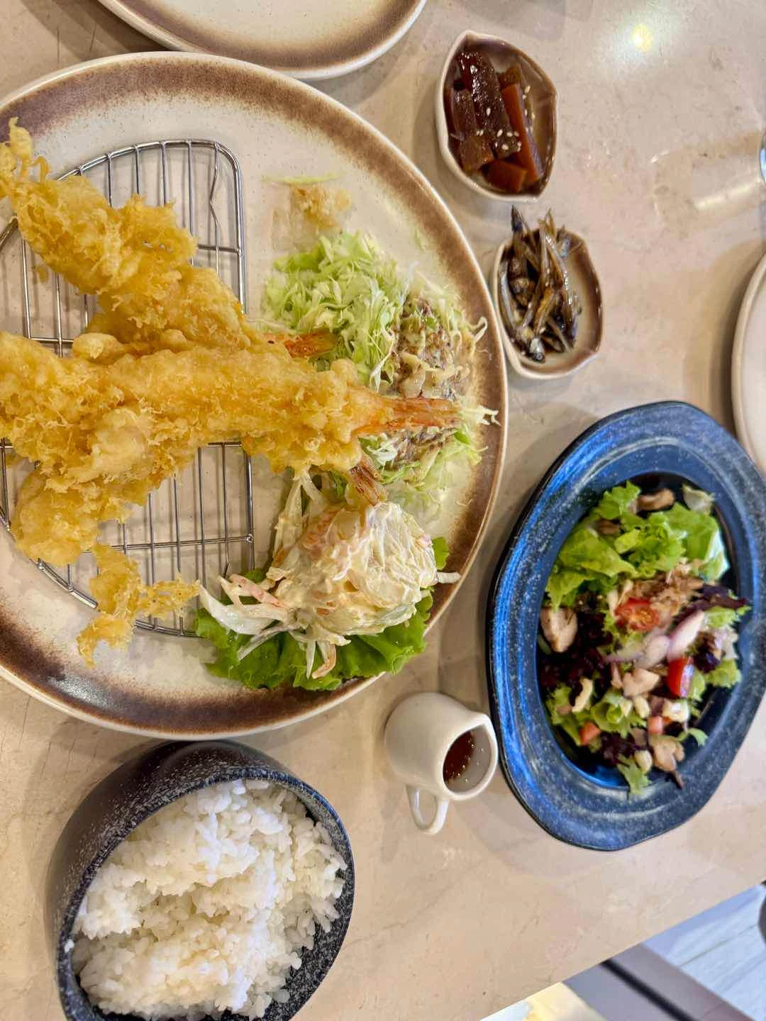 Tempura meal - tempura, rice, miso soup, potato salad and cabbage