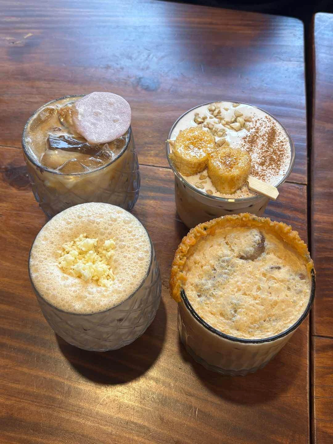 (from top left to bottom right) ube latte, banana bread latte, maja latte, apsol’s best