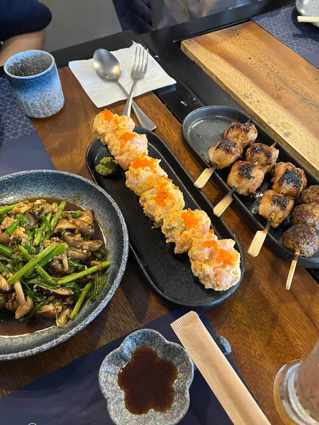 spicy salmon maki & chicken skewers