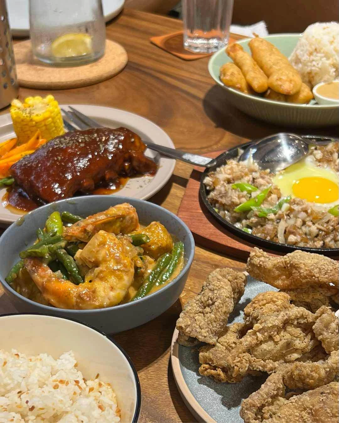 Pork Ribs, Ginataang Kalabasa, Pork Sisig, Chicken Skin, and Chicken Tenders of Lokasyon MNL
