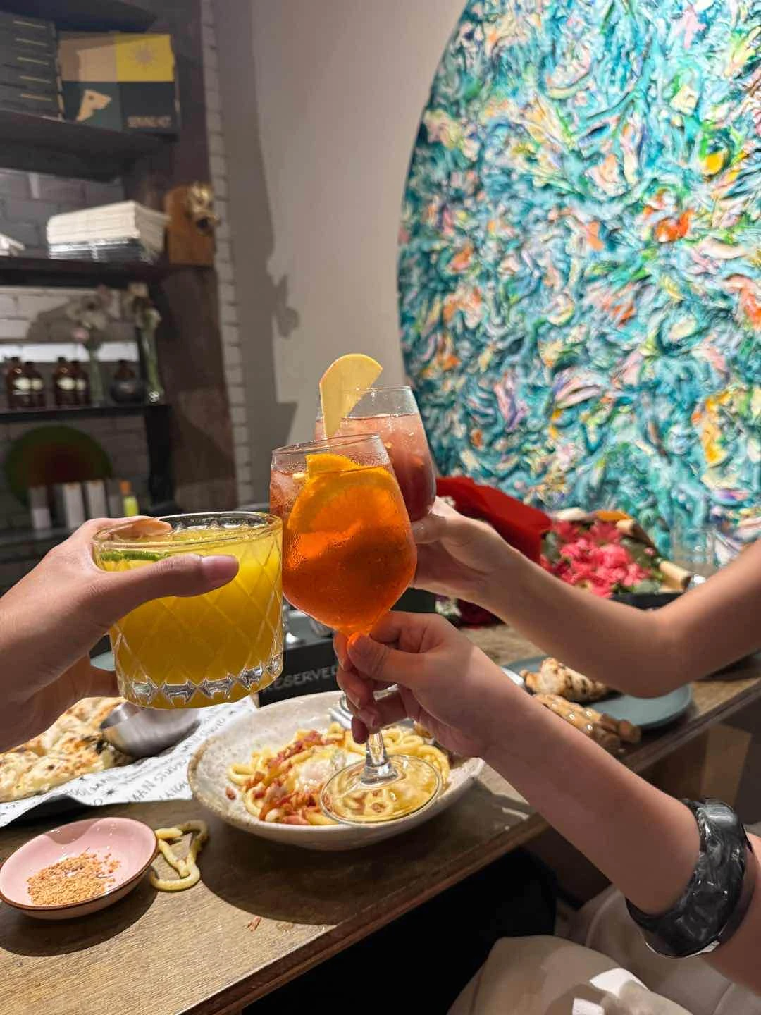 Mango daquiri, aperol spritz, frozen sangria