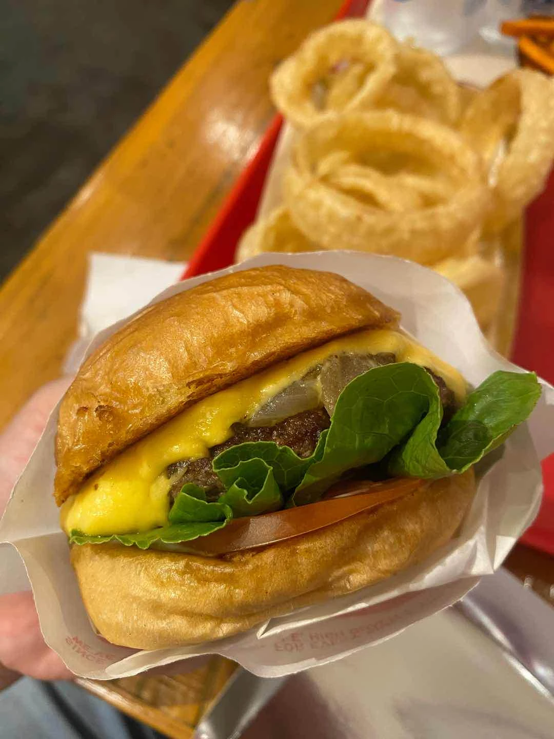 Classic cheeseburger + onion rings of Sweet Ecstasy