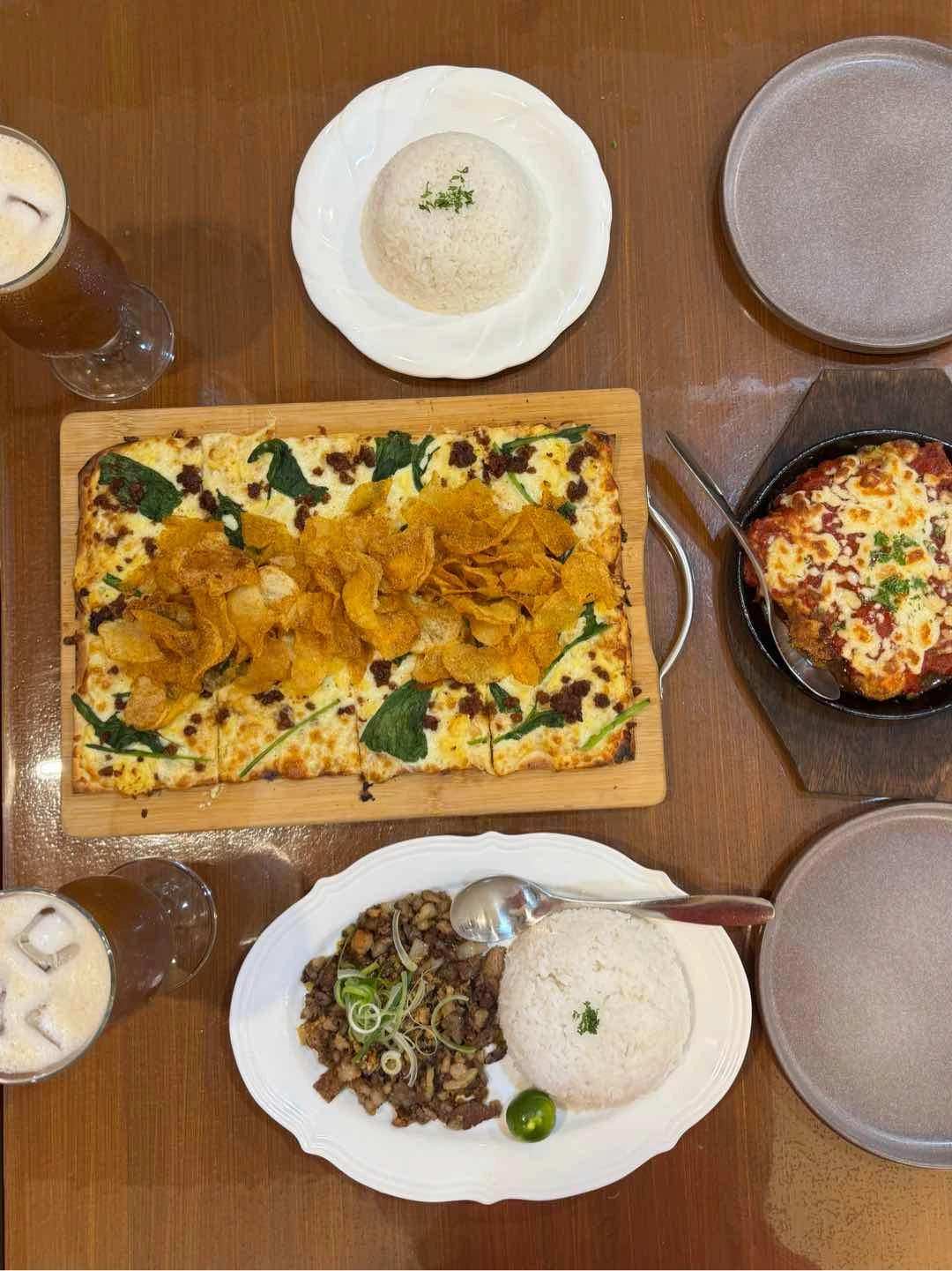 • Carbonara & Mustasa Pizza • Chicken Skillet with Rice • Sisig with Rice • House Blend Iced Tea