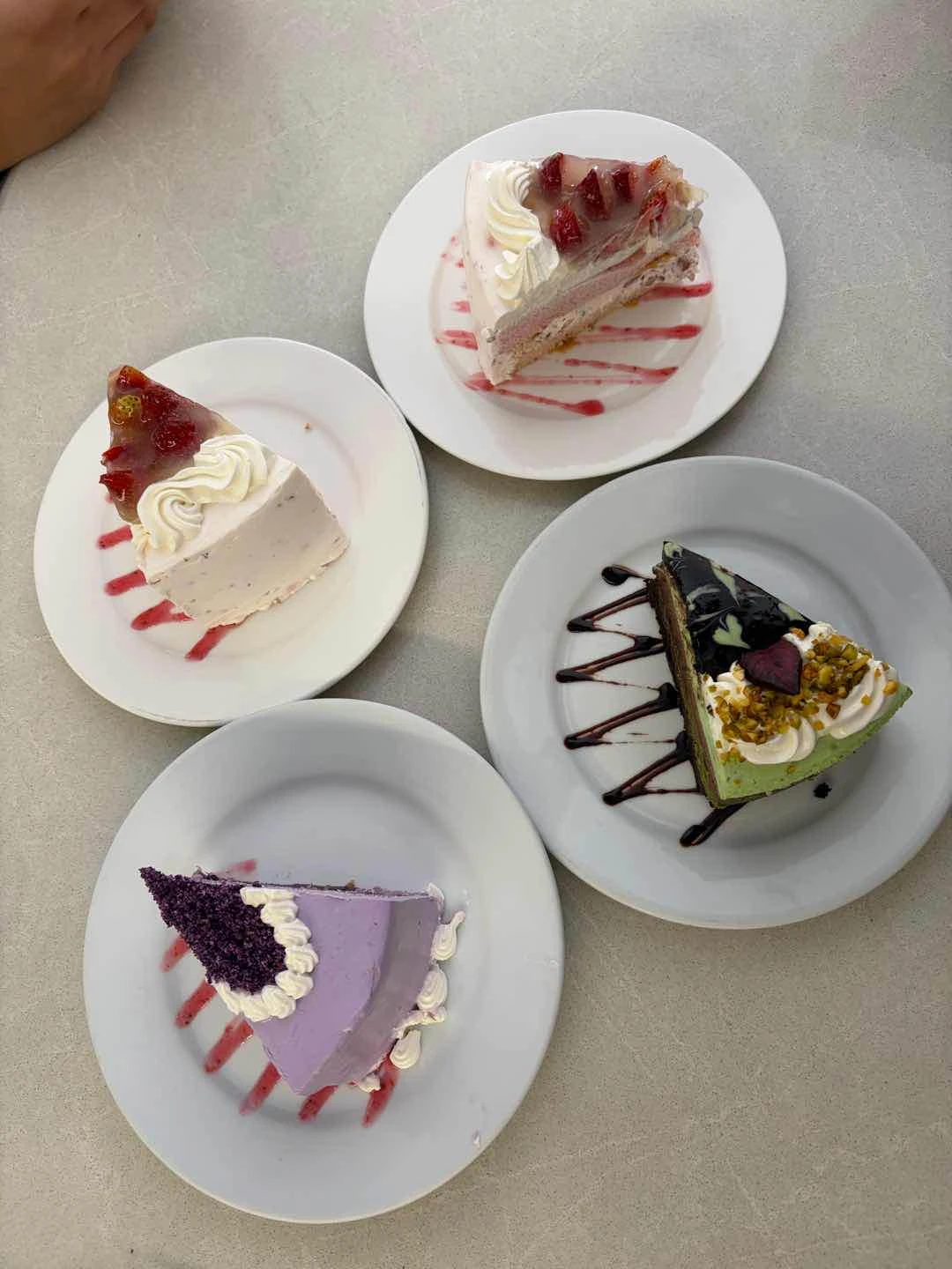 strawberry shortcake, ube cake, and pistachio cake 