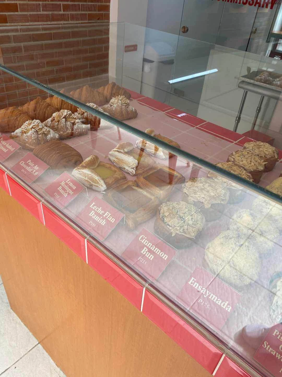 pastry display i got pain au chocolat and ensaymada to go