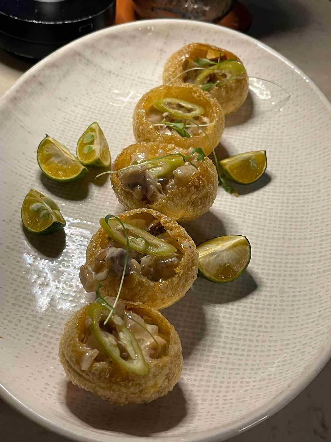 pani puri x sisig!!! But tasted like normal sisig with crunch. No new flavors of Eesome