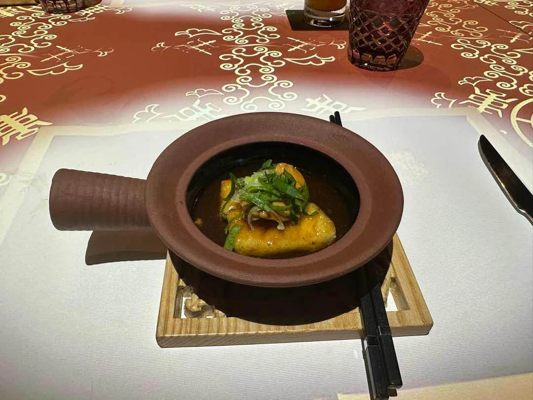 China: Braised Sea bass (10 head abalone, ginger, garlic, black bean sauce)