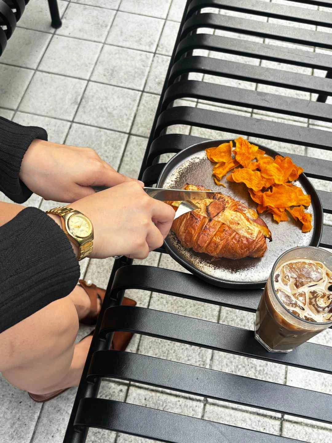smoked bacon and cheese croissant and iced dirty mocha