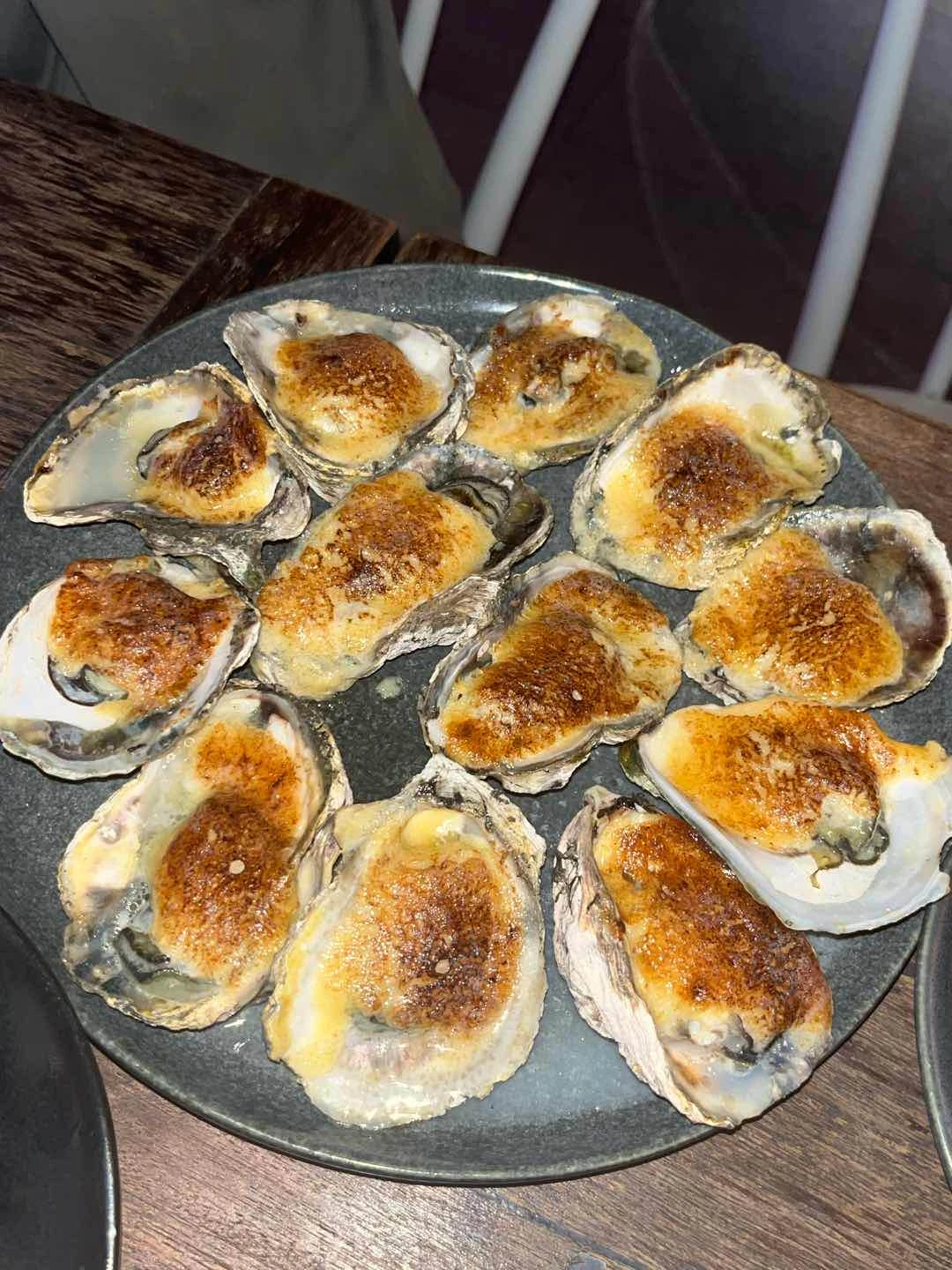 baked oysters are not baked? cheese was torches so oysters arent cooked
