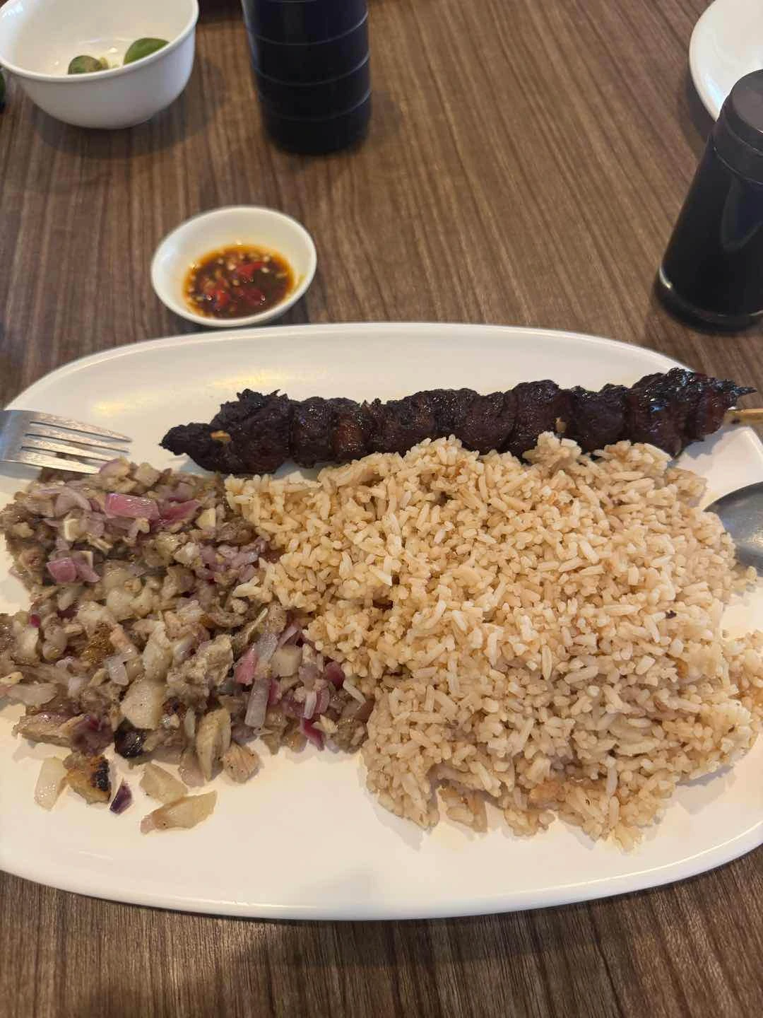 Sisig and barbeque rice meal