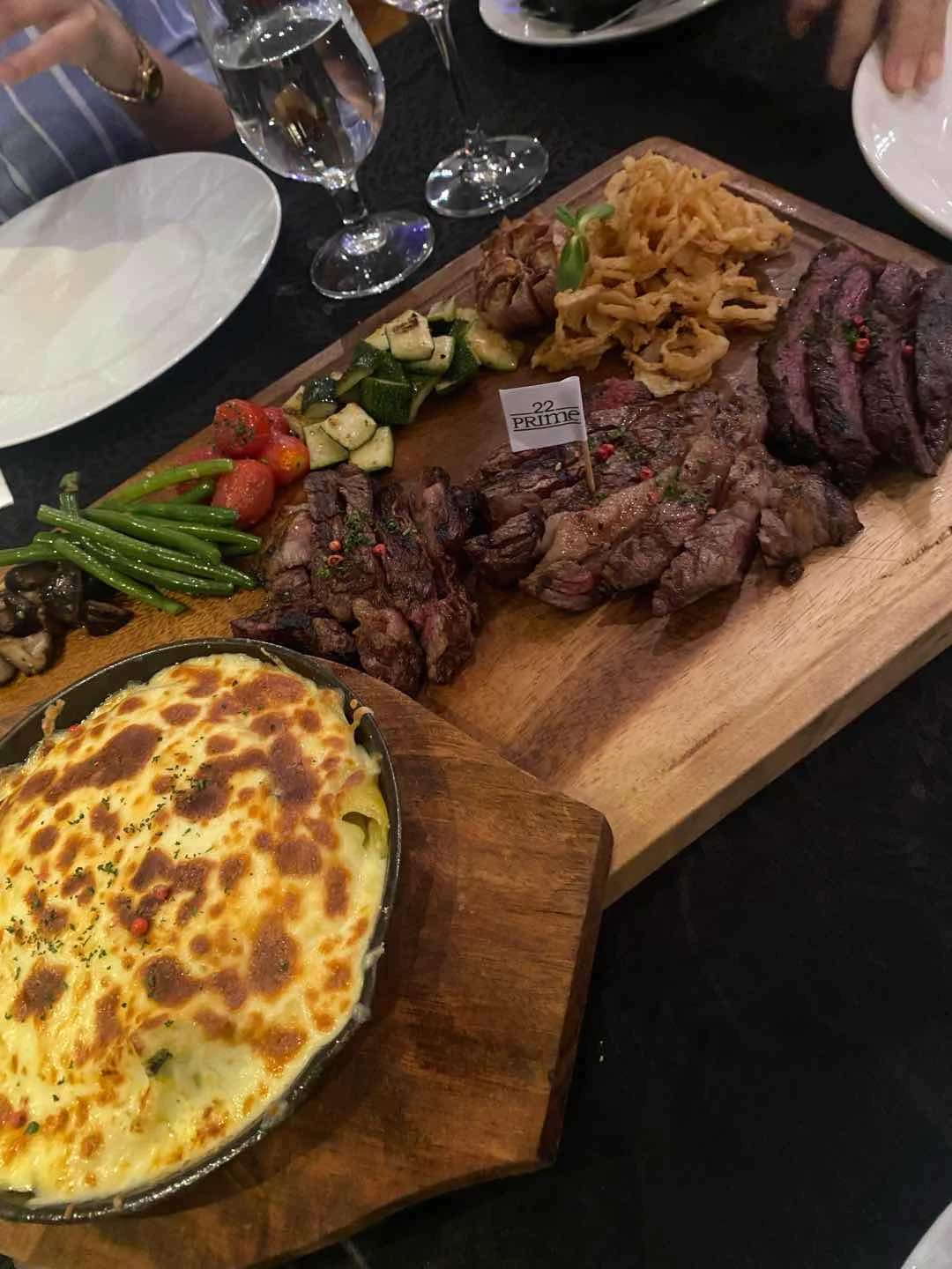 steaks, mac and cheese, fried onions