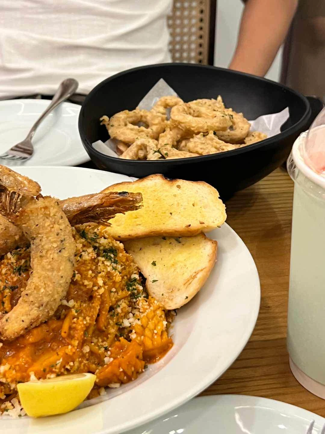 Some pasta, Calamares, Strawberry Yogurt Smoothie, Coffee