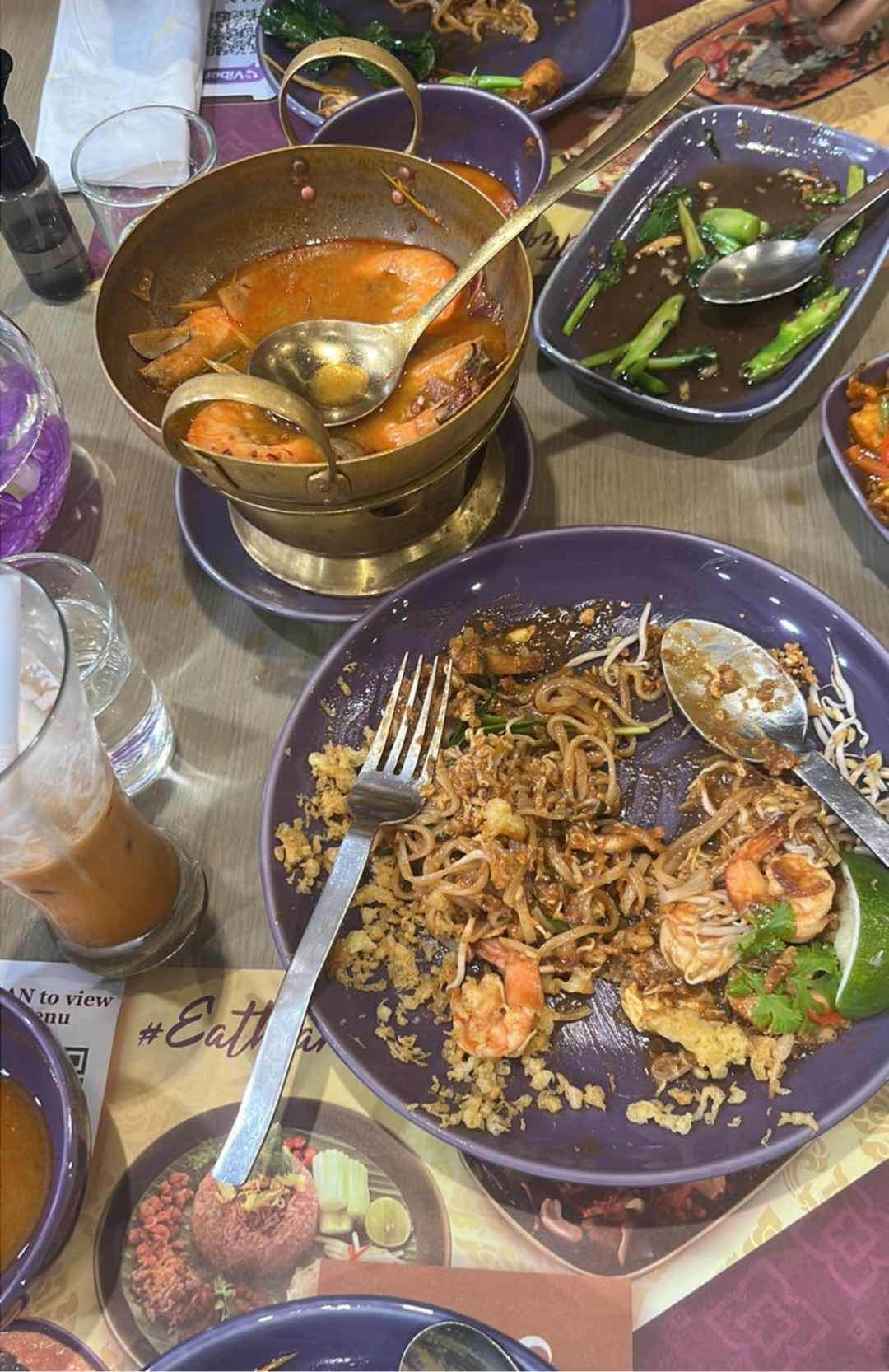 Pad Thai, Tom yum soup, veggies, and thai milk tea