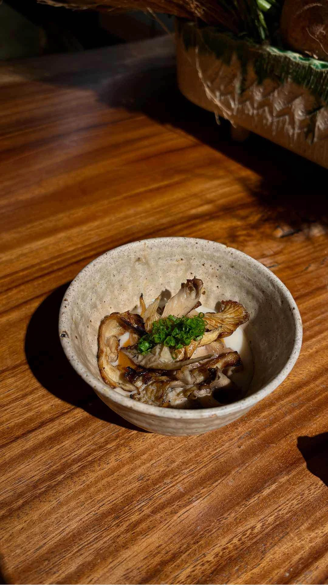 Grilled mushrooms with soft boiled egg of Toyo Eatery