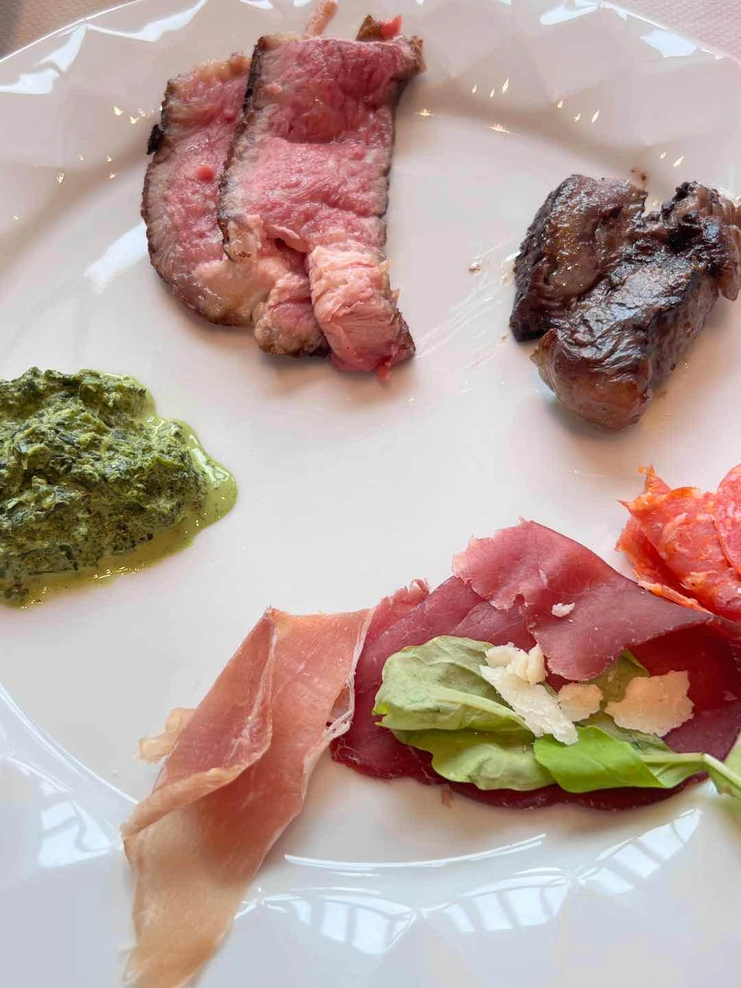 Mix of cured meat and steaks