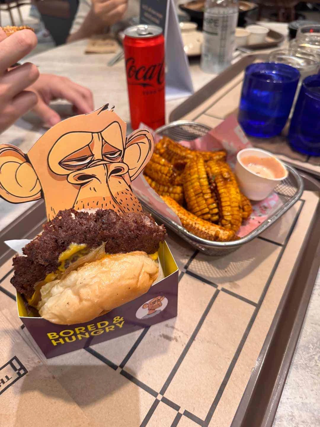 bored og burger and cajun corn