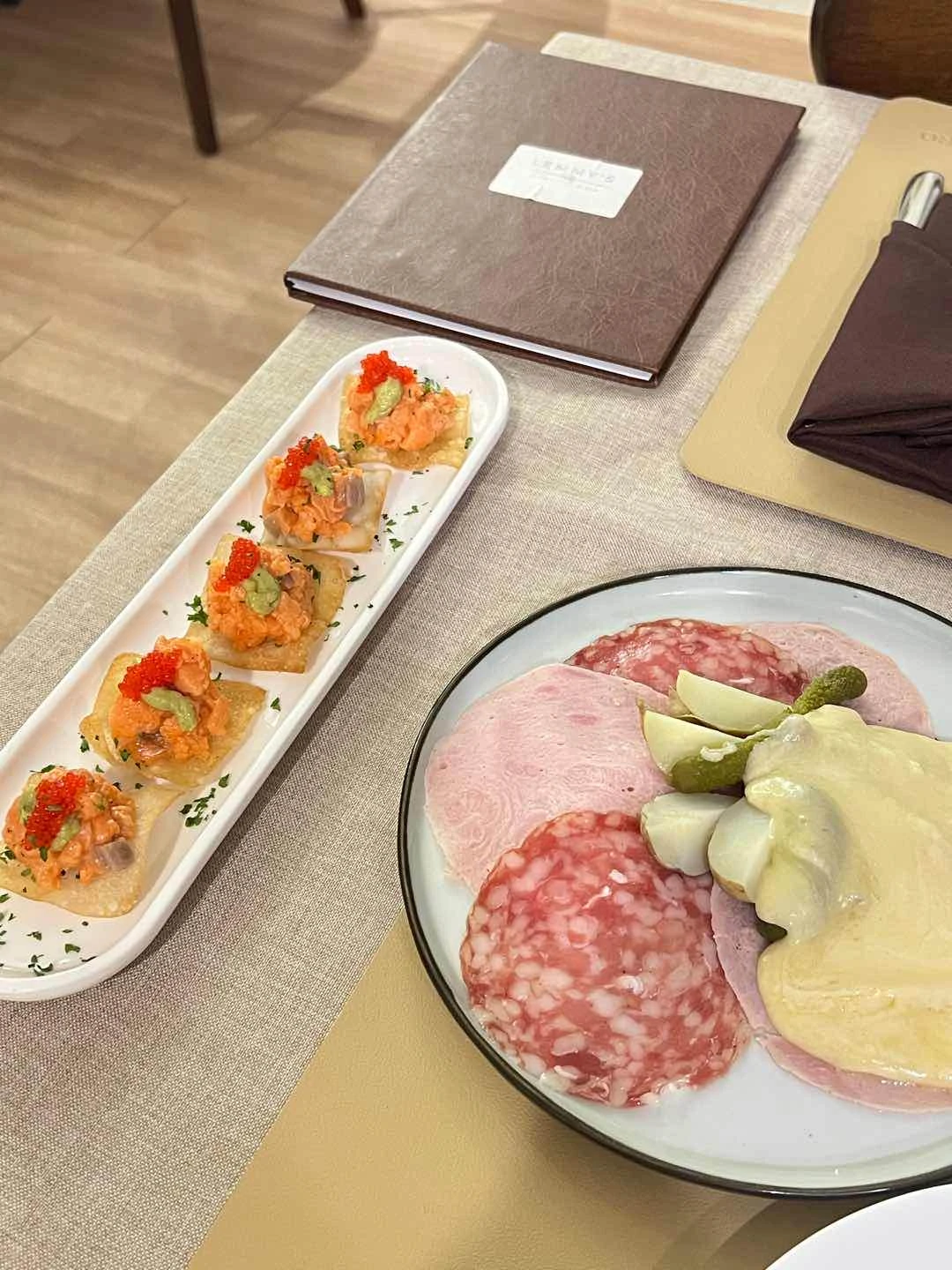 Salmon Buchee with Caviar and Petit Raclette Plate