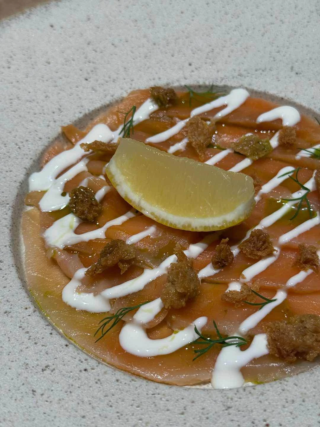 Juniper cured salmon. Smoked sour cream and dill