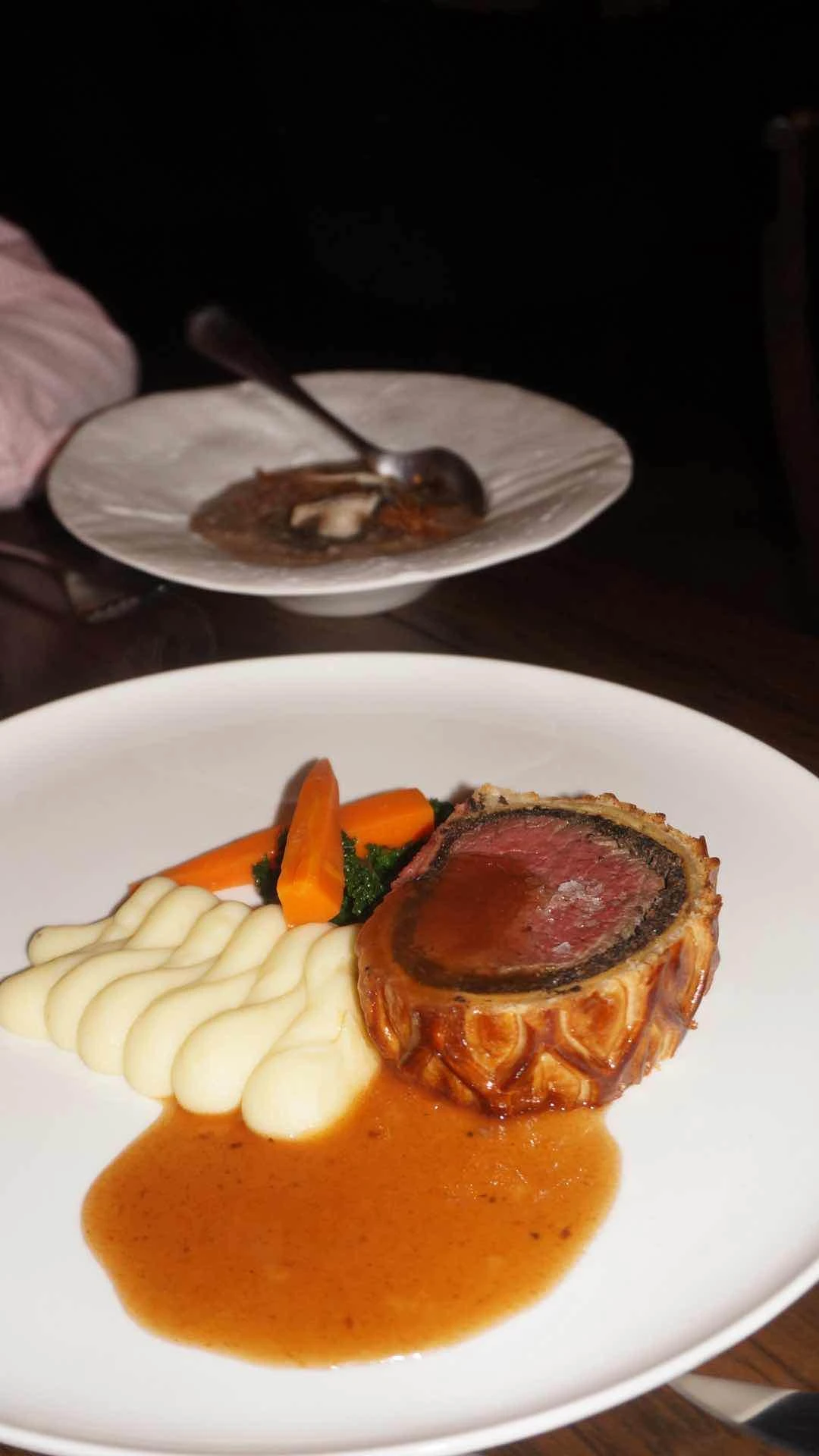Beef wellington and risotto in the back of Gordon Ramsay Bar & Grill