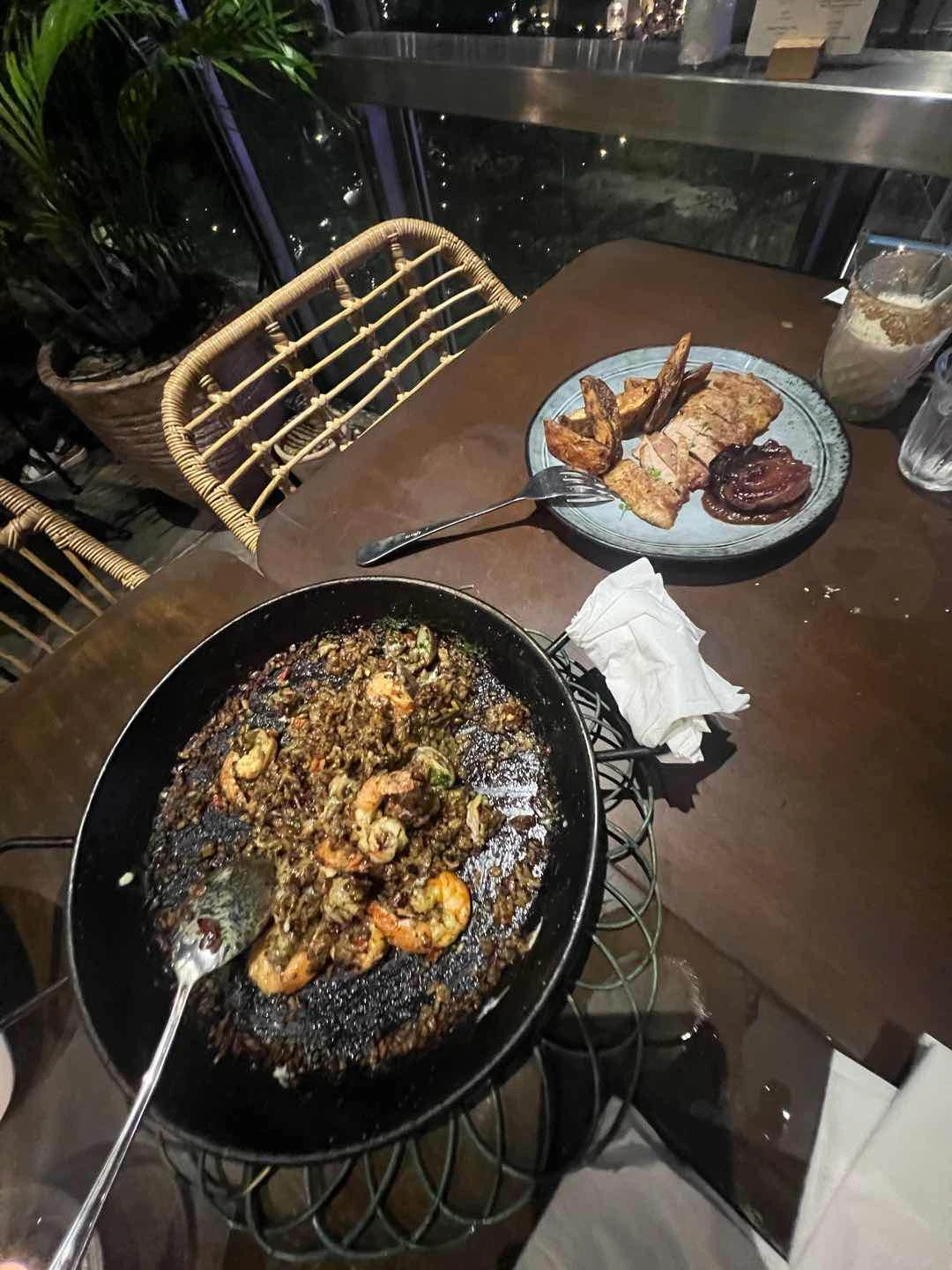 Paella de Marisco (left) Secreto Iberico (right)