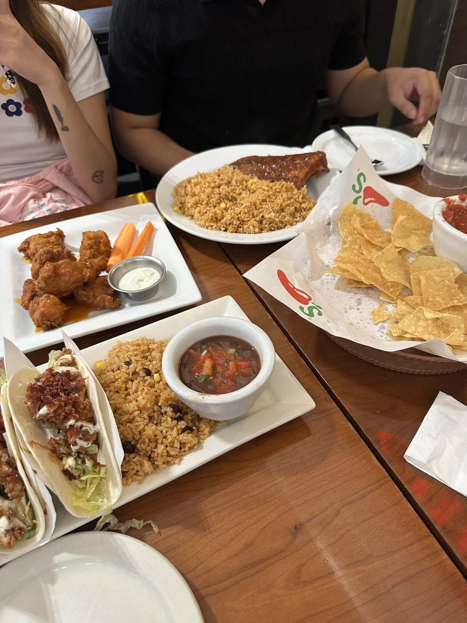 Crispy Chicken Tacos, Boneless Buffalo Wings, Baby Back Ribs & Unlj Tostada Chips