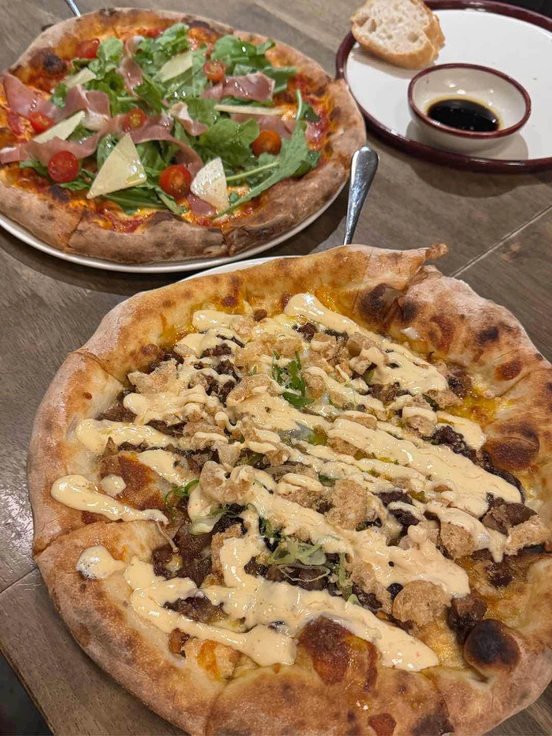 Prosciutto Rucola (left) and Sisig (right)