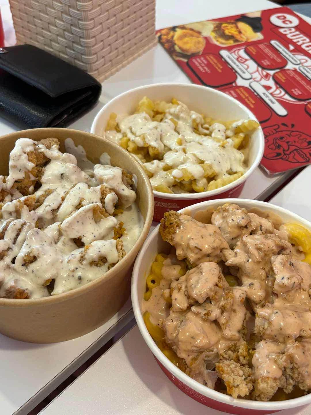 dc w/ og sayce and mac, fries w/ garlic sauce, dc w/ garlic sauce and java rice of Drizzled Chicken (main branch)