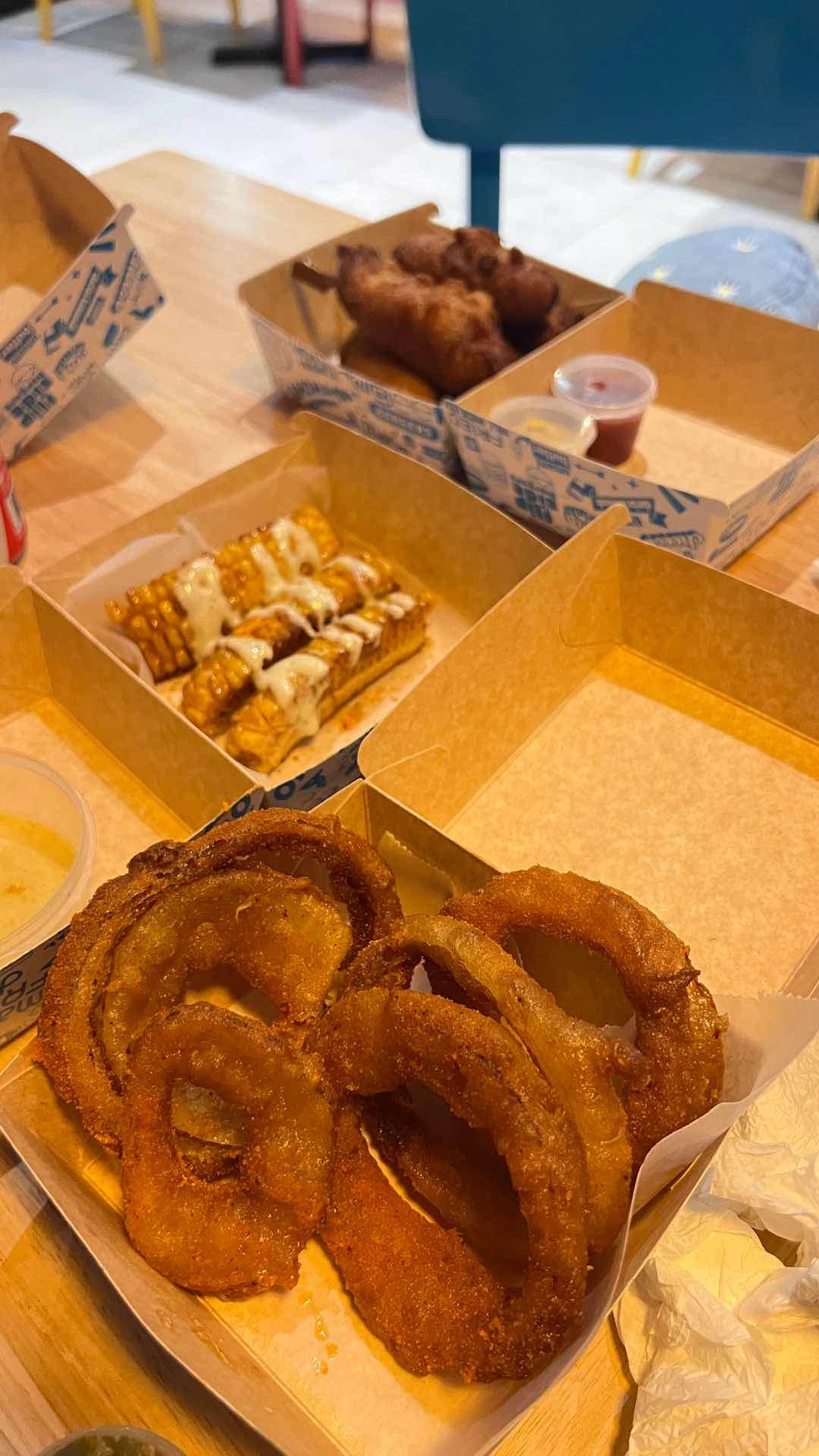 Sides: Flavored Onion Rings, Friend Corn Ribs Elote, Mini Corndogs of FlipSide Burgers - Alabang West Parade