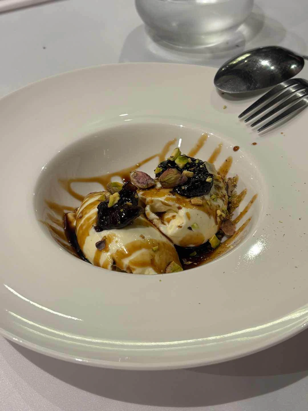 crema de queso fresco (cream cheese mousse w/ prunes & pistachios)