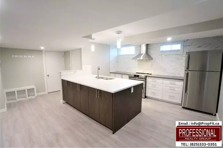 Photo of 3 BEDROOM 2 FULL BATH!!! 4 FT x 8 FT HUGE ISLAND-BRAND NEW- BRIGHT LEGAL BASEMENT SUITE-PET OK Property Image