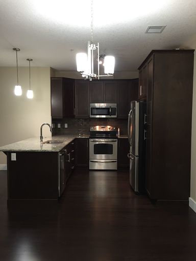 Photo of 2 Bedroom Luxury Condo in MacTaggart- 1000sq.ft Property Image