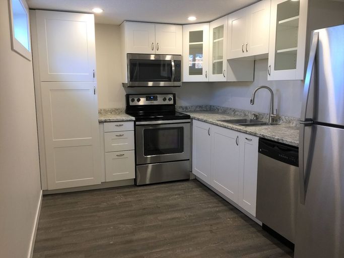 Photo of RENOVATED 2BR + den, bright and modern basement suite by Westbrook Property Image